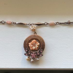 Cute locket necklace.